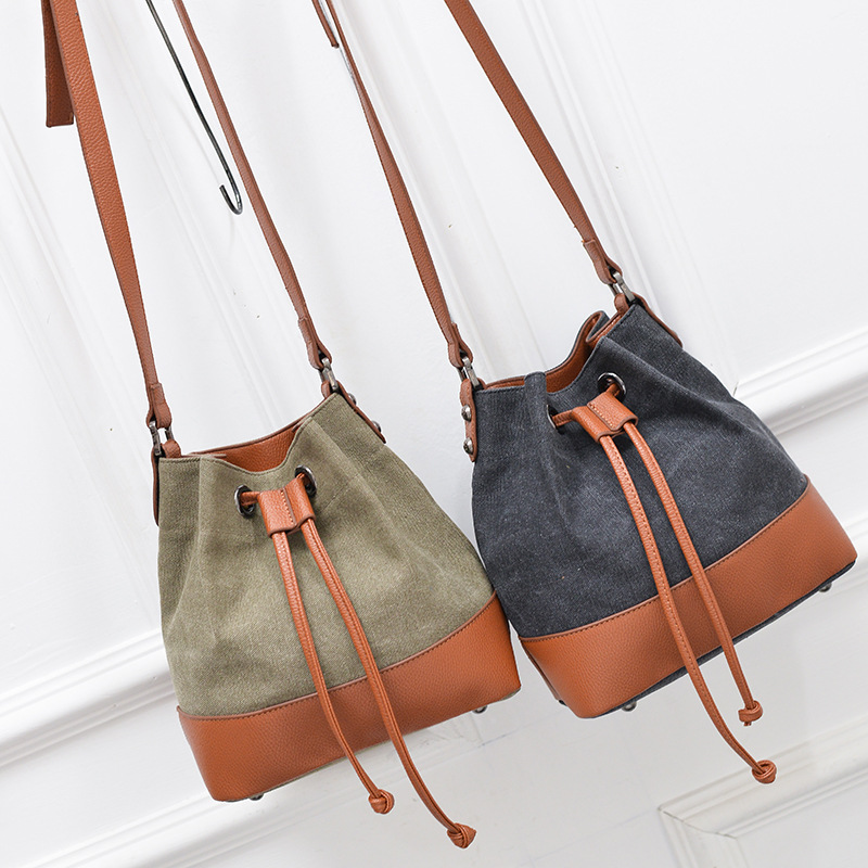 Leather and Canvas Bucket Bag with Adjustable Shoulder Straps 